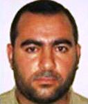 [Picture of Abu Bakr Al-Baghdadi]